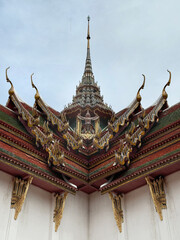 Fototapeta premium Sanphet Prasat Palace or black roof Ayutthaya Palace replica in Muang Boran Ancient City, Samut Prakan, Bangkok, Thailand. With its beautiful ornamental details