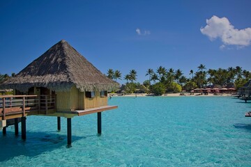 Crystal clear, turquoise waters fill the lagoon of Bora Bora