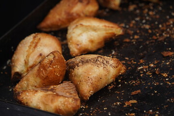 Baked tandoor samsa. Baking with different meats.