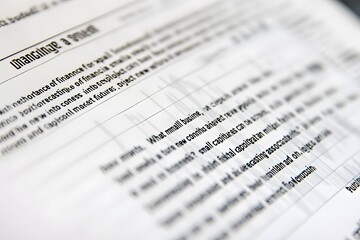 Fototapeta premium Close-up of a Page with Text About Managing a System