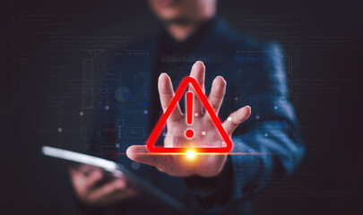 Warning alert icon concept. Programmer or developer use computer tablet to program access security...