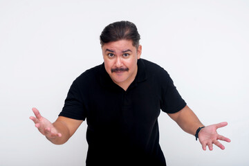 A frustrated middle aged man leaning forward asking for an explanation. Looking both baffled and upset. Isolated on a white background.