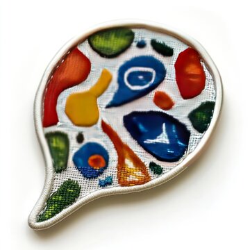 recommend clip art: Abstract colorful design in a speech bubble shape with a silver outline, on a white background.