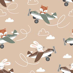 Seamless vector pattern with cute hand drawn fox and rabbit on vintage airplane. Perfect for textile, wallpaper or nursery print design. EPS 10 vector file. © MirabellePrint