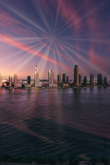Fototapeta premium A breathtaking view of Jersey City from New York at sunset. The serene river reflects the city’s skyline, with vibrant sun rays adding a dramatic touch to the urban landscape, offering a mesmerizing c