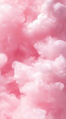 Fototapeta premium Pink pastel background with fluffy clouds.