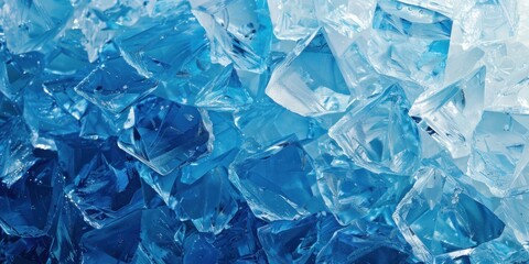 Obraz premium Close-up of blue ice cubes with detailed crystalline structure. Cold and refreshing concept for beverage or cooling design.