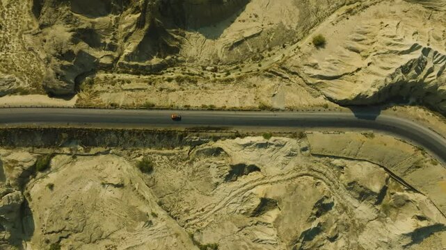 Aerial top shot of baren conditions of Buzi pass top near Makran coastal Highway in Balochistan, Pakistan.