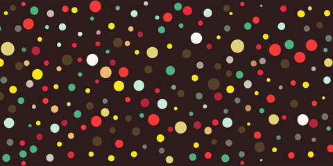Colorful dots of various sizes scattered across a dark background
