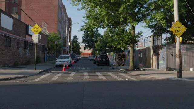 Handheld shot of a dead end street in Brooklyn