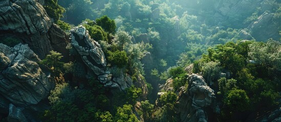 Aerial photography of a scenic Asian exotic landscape featuring steep rocks and dense forests. Copy space image. Place for adding text and design