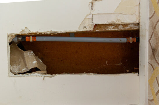 one pips in whole in wall water leak