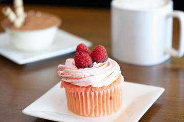 Desserts and a coffee drink on a table top