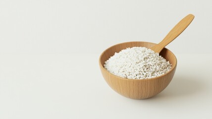 A close-up view of a bowl filled with white granular substance, perfect for culinary uses and minimalist kitchen decor.