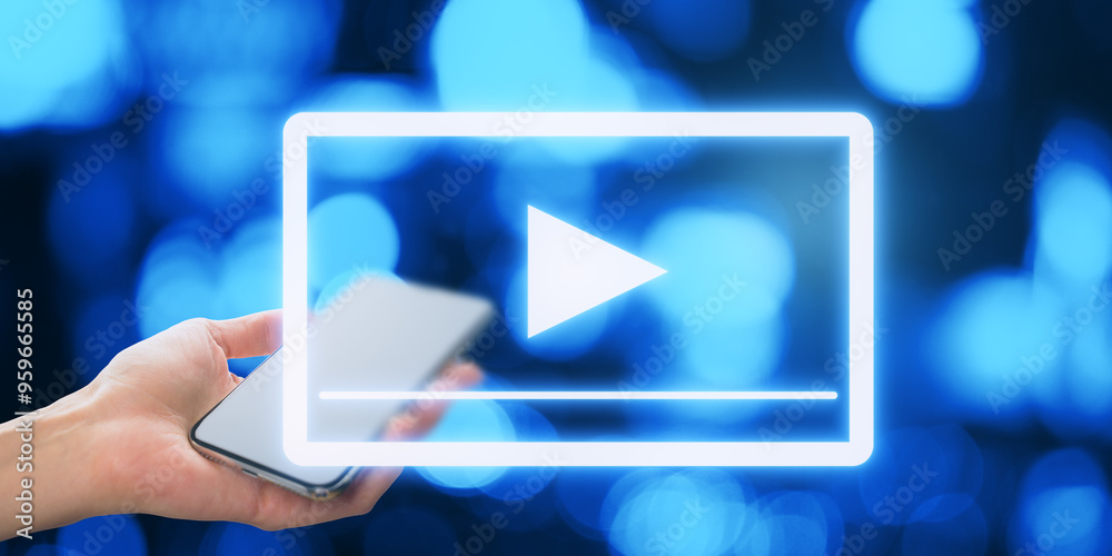 Poster close up of female hand holding cellphone with glowing play button on blurry bokeh background. techn