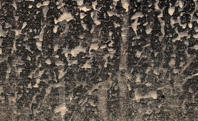 Dirt on the body of a black car. Abstract background