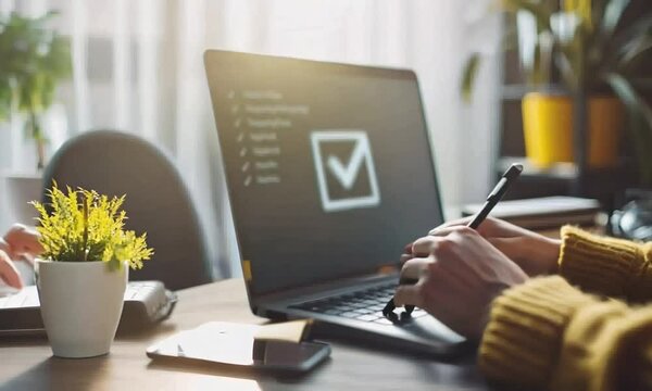Person working on a Laptop in Office