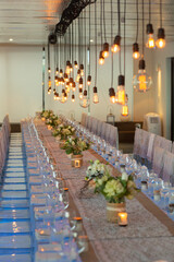 Long table set up at a wedding reception