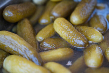 pickled cucumbers in vinegar. detail.