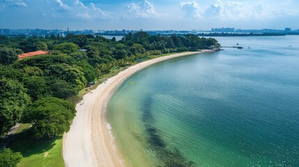 Fototapeta premium Aerial perspective of Changi Beach Park, with its tranquil waters and historical significance during World War II.