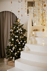 Interior bedrooms in Scandinavian style, decorated for the Christmas holidays. Live ate in the interior.