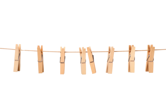 A row of wooden clothespins hanging on a white clothesline, swaying gently in the breeze, isolated on a white background