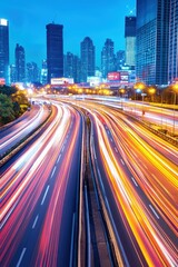 Obraz premium Vibrant Cityscape at Dusk with Light Trails from Traffic on a Busy Highway