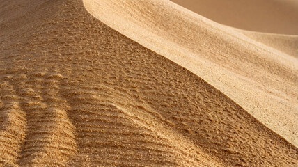 Desert sand pile isolated on white background