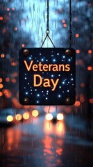 Veterans Day glowing digital sign on rainy night with bokeh lights