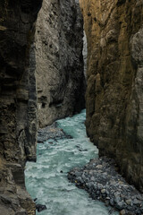 Hiking to the Gletscherschlucht glacier in Grindelwald, with imposing canyons, waterfalls and panoramic views of the valley. Swiss Alps