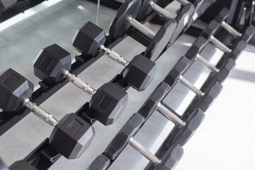 Dumbbell equipment in fitness gym, Black dumbbell.