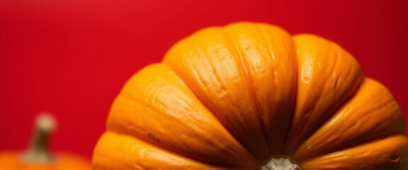 fresh pumpkin and orange, clean red background,