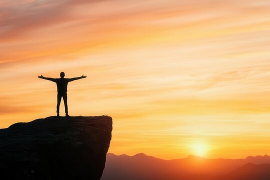Person standing on a cliff overlooking a sunrise, arms outstretched, embracing new beginnings