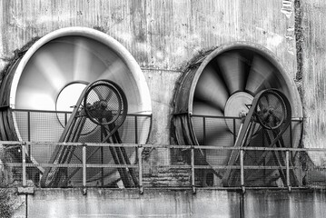 old rotating industrial gross cooling fans