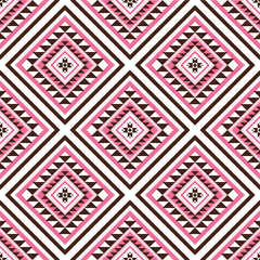 Geometric ethnic oriental seamless pattern with pink background.Designing for background,carpet,clothing, wrapping,batik,fabric, tablecloth,tile, textile and etc. Vector illustration.