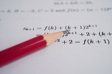 Pencil on mathematic formula exercise test paper in education school. © manassanant