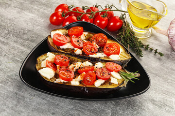 Baked eggplant with cheese and tomato