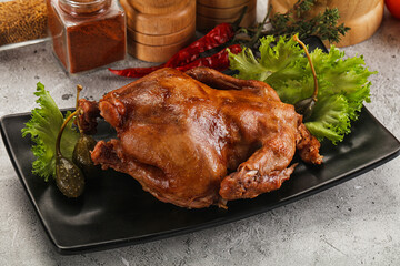 Baked small chicken with spices