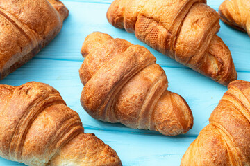 Group of sweet croissant . French morning breakfast . Top view