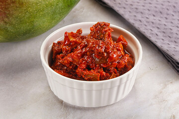Spicy pickled raw green mango