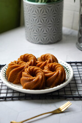 Steamed caramelized sweet and soft cake, locally known as Kuih Apam Gula Hangus.