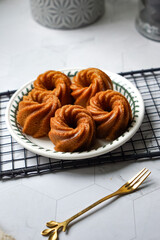 Steamed caramelized sweet and soft cake, locally known as Kuih Apam Gula Hangus.