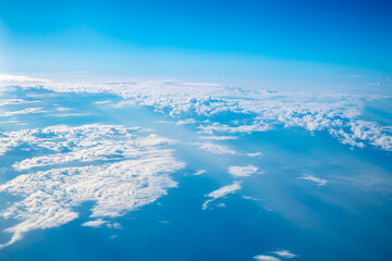 view of beautiful white clouds in the sky, natural background, view from plane, top view