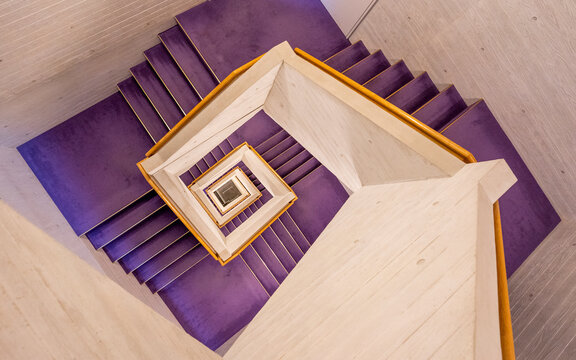 View of beautiful purple spiral staircase in modern architecture, Tokyo, Japan.