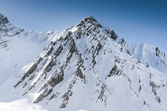 View of snow mountains and frozen rivers in winter, Pin Parvati Valley, Kaza, Spiti Valley, Himachal Pradesh, India.