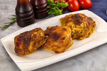Roasted chicken thighs  with spices