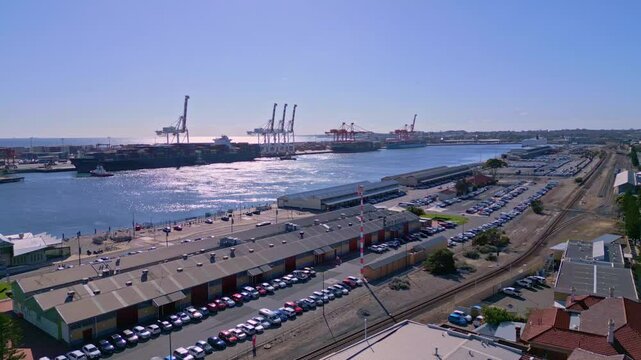 Fremantle Port and railway line with cargo ships on a sunny day, Perth, Western Australia