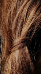 Fototapeta premium Detailed observation of hair strands reveals noticeable split ends, emphasizing hair health and texture