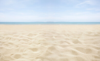Fototapeta premium Selective Focus.Sandy beach scene with smooth dunes fading into the distant horizon. The soft sand and calm blue sky evoke a peaceful, relaxing atmosphere day