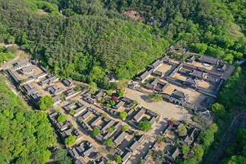 Aerial and spring view of roof, tile house, open set, film site, movie, drama, Mungyeongsaejae Pass, Sangcho-ri, Mungyeong-si, Gyeongsangbuk-do, South Korea - May 5, 2021: 